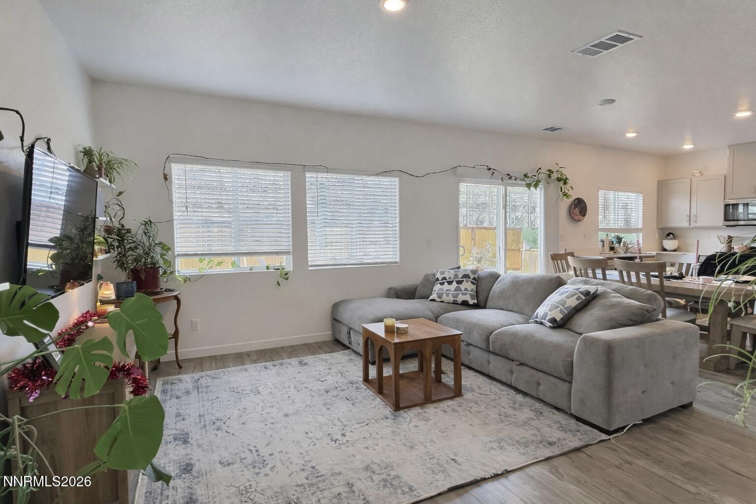 641 Pleasant Vista Drive Reno, NV 89506 - Photo 8 of 30 a living room with furniture and a potted plant
