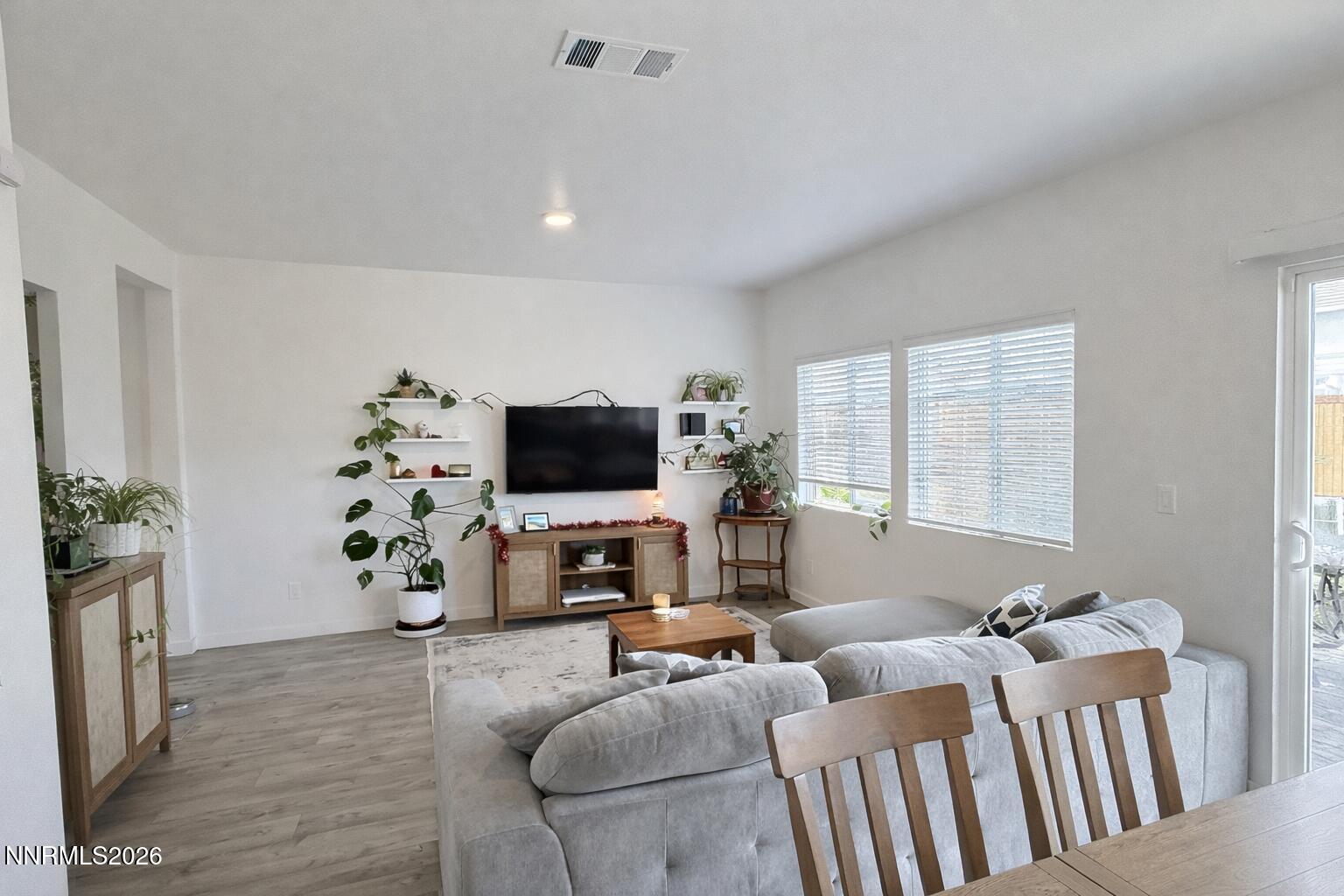 641 Pleasant Vista Drive Reno, NV 89506 - Photo 9 of 30 a living room with furniture and a flat screen tv