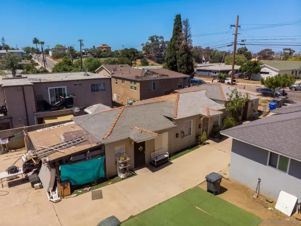 a view of a house with a big yard