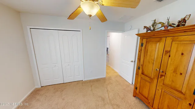 a view of a closet in a room