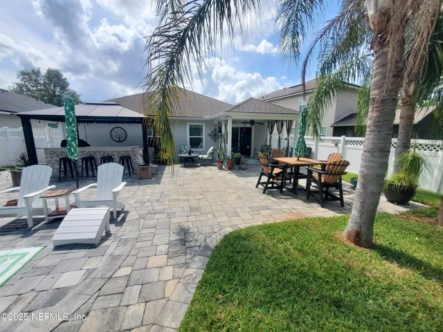a front view of a house with a patio