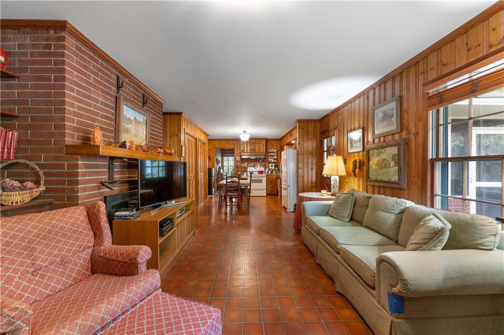 79 Floyd Road Southwest Cartersville, GA 30120 - Photo 19 of 50 a living room with furniture and a flat screen tv