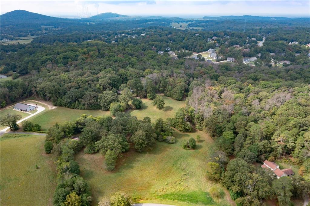 79 Floyd Road Southwest Cartersville, GA 30120 - Photo 2 of 50 a view of a lake with mountains in the background