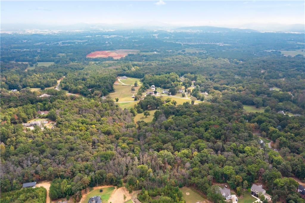 79 Floyd Road Southwest Cartersville, GA 30120 - Photo 44 of 50 an aerial view of a houses with a yard