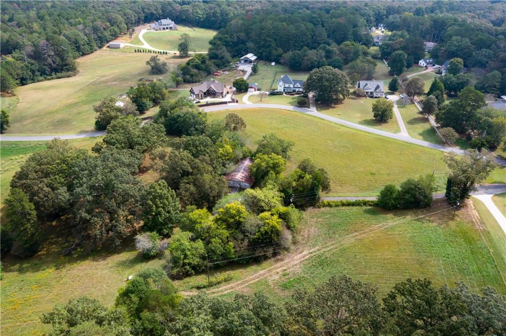 79 Floyd Road Southwest Cartersville, GA 30120 - Photo 46 of 50 a view of a houses with swimming pool