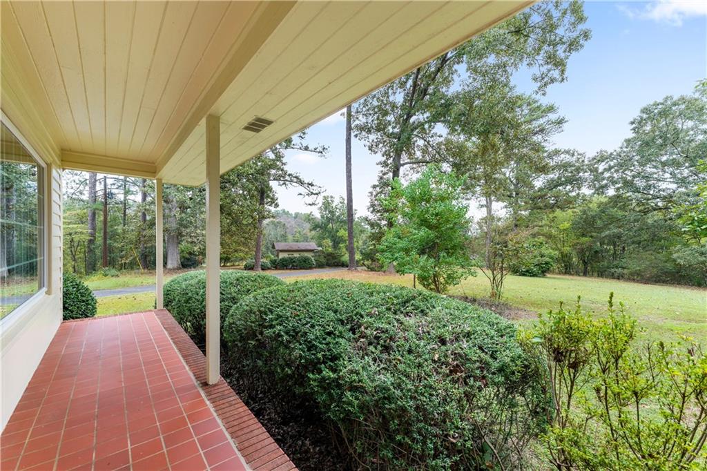 79 Floyd Road Southwest Cartersville, GA 30120 - Photo 6 of 50 a view of a backyard with garden