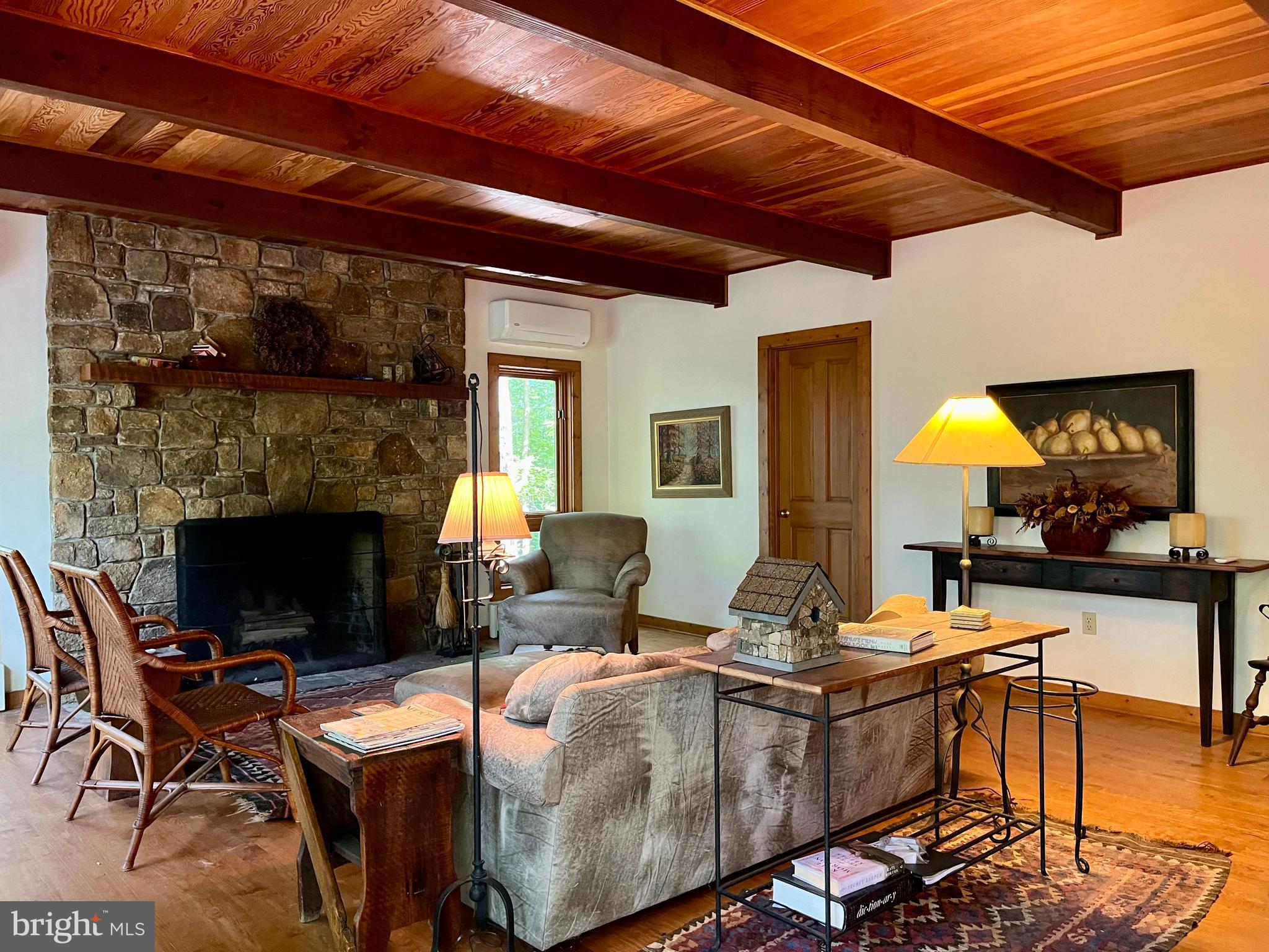 740 Long Mountain Road Washington, VA 22747 - Photo 9 of 51 Living with wood beams and brand new Mini splits