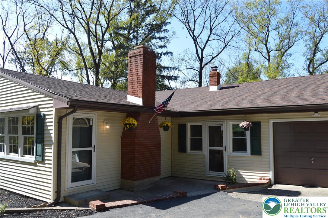930 Morvale Road Easton, PA 18042 - Photo 2 of 36 a front view of a house with garden