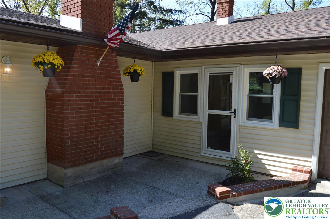 930 Morvale Road Easton, PA 18042 - Photo 31 of 36 a front view of a house with a yard