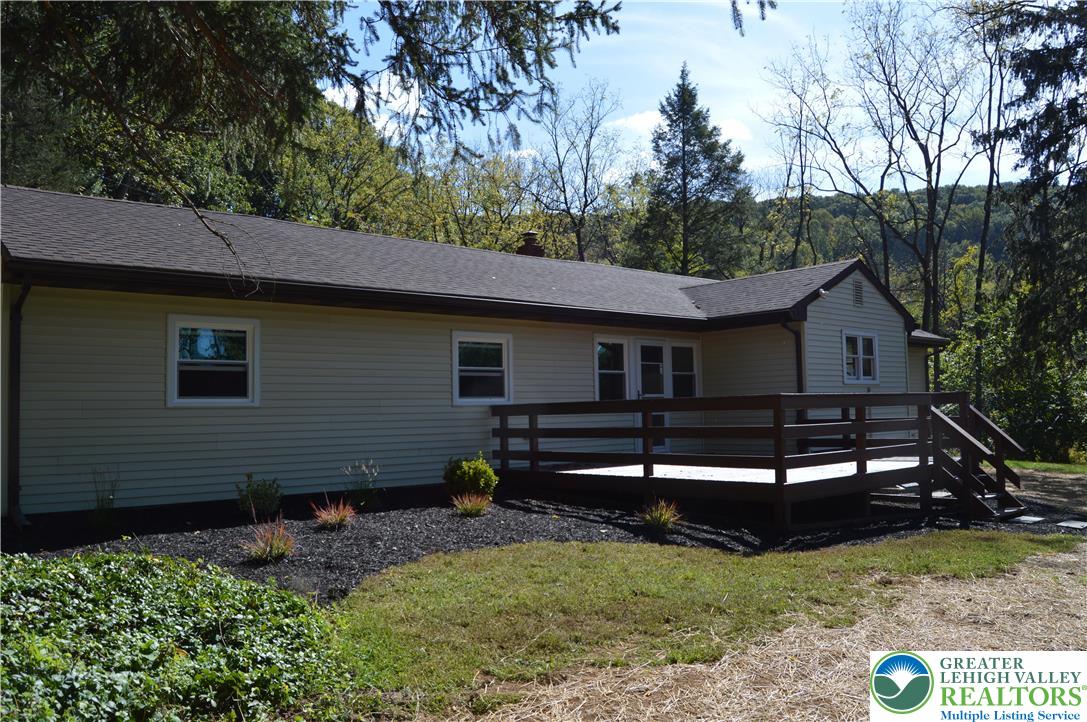 930 Morvale Road Easton, PA 18042 - Photo 6 of 36 a front view of a house with garden
