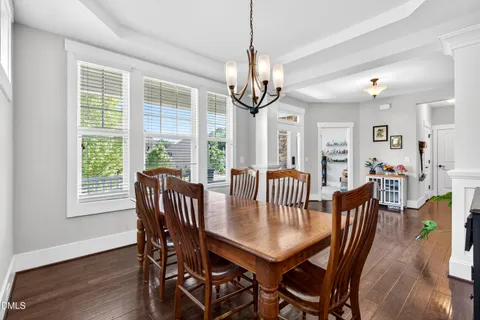 a kitchen with stainless steel appliances granite countertop a stove refrigerator and a microwave