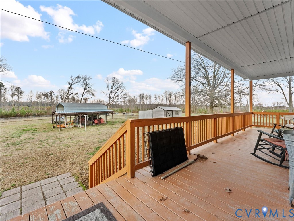 10885 Zilles Road Wilsons, VA 23894 - Photo 39 of 44 a view of balcony with furniture