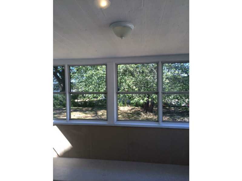 109 Monroe Street Woonsocket, RI 02895 - Photo 7 of 10 Porch. Enclosed Huge Porch