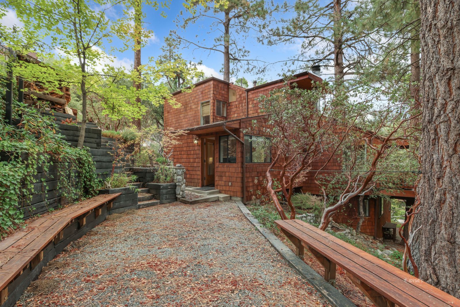 55100 Pine Crest Avenue Idyllwild, CA 92549 - Photo 23 of 50 a view of a house with a yard