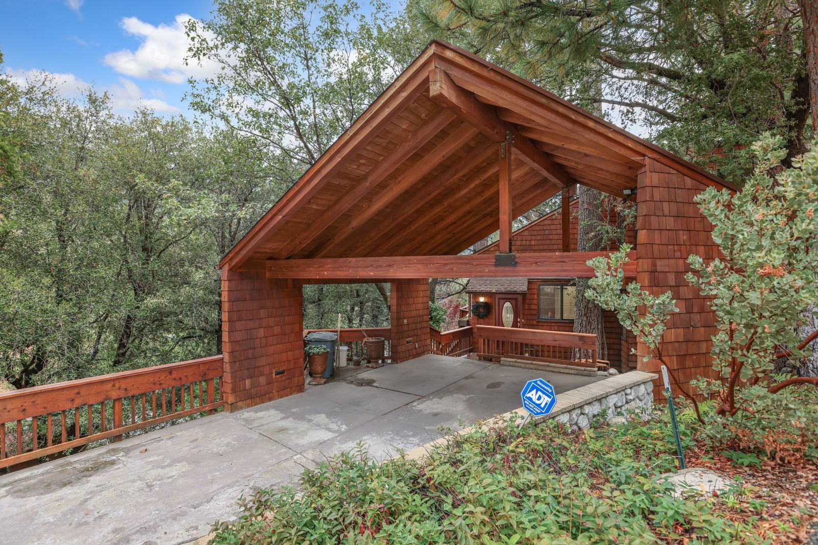 55100 Pine Crest Avenue Idyllwild, CA 92549 - Photo 4 of 50 a backyard of a house with seating space