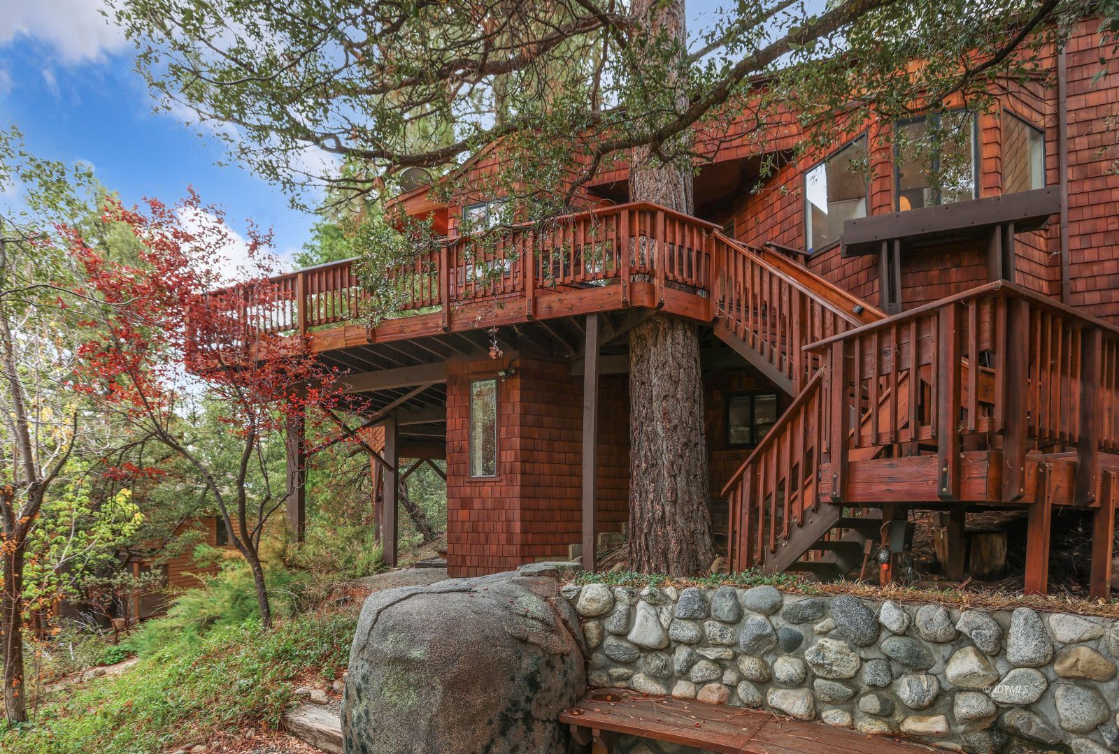 55100 Pine Crest Avenue Idyllwild, CA 92549 - Photo 41 of 50 a view of a house with wooden fence