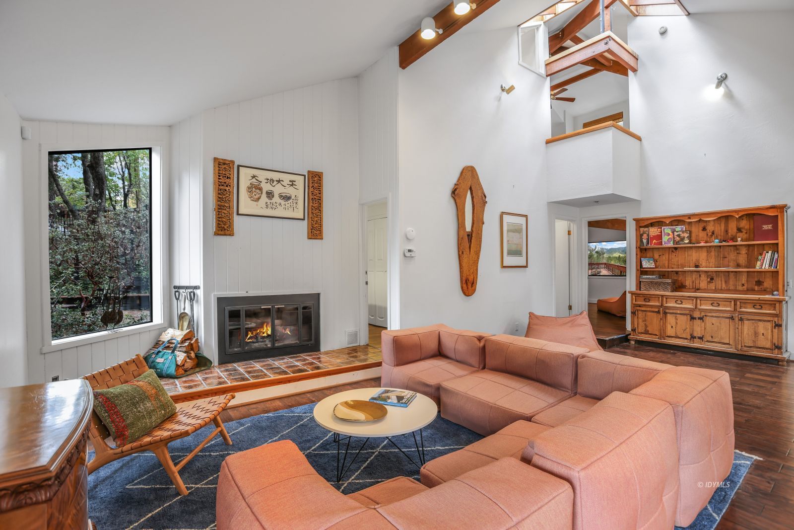 55100 Pine Crest Avenue Idyllwild, CA 92549 - Photo 9 of 50 a living room with furniture and a fireplace