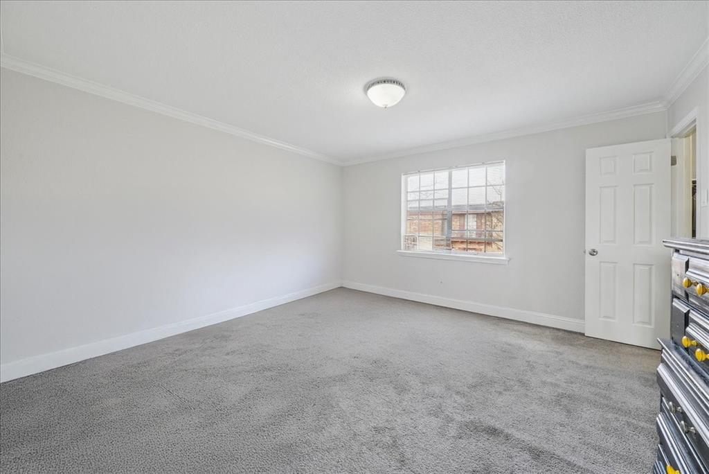 1819 East Grauwyler Road, Unit 178 Irving, TX 75061 - Photo 14 of 22 an empty room with a window