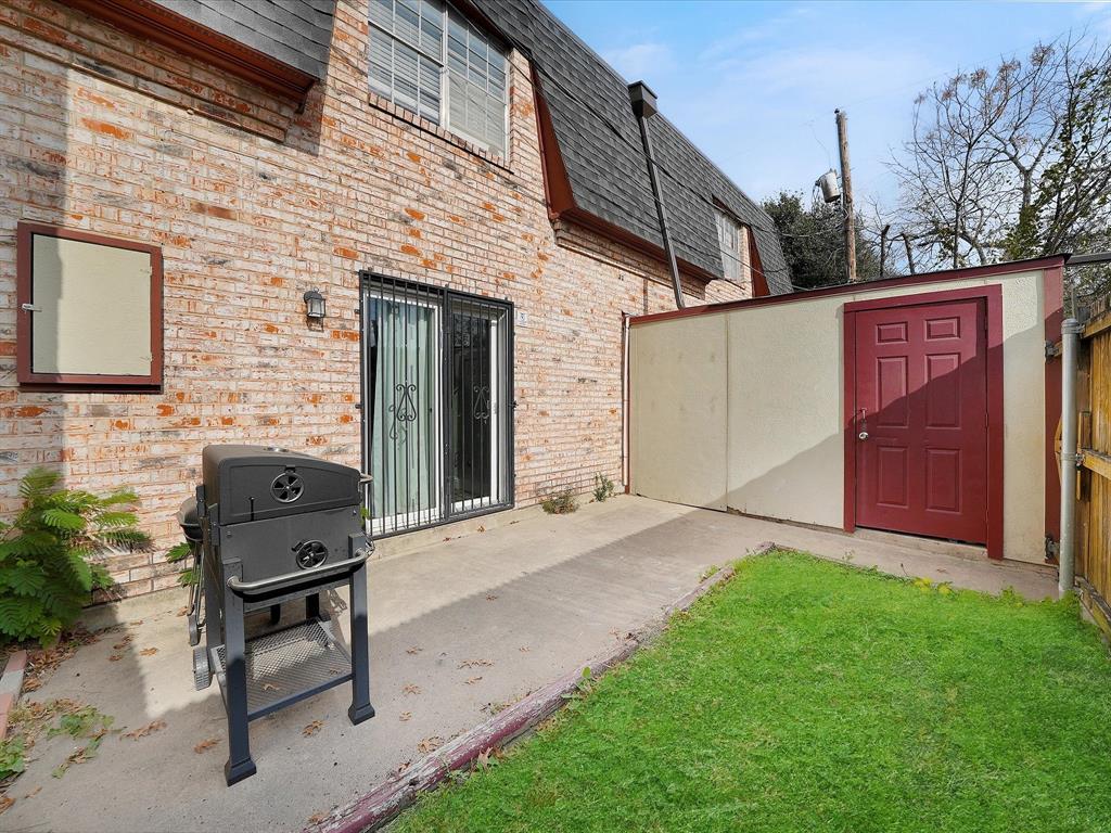 1819 East Grauwyler Road, Unit 178 Irving, TX 75061 - Photo 17 of 22 a view of a chair and table in front of house