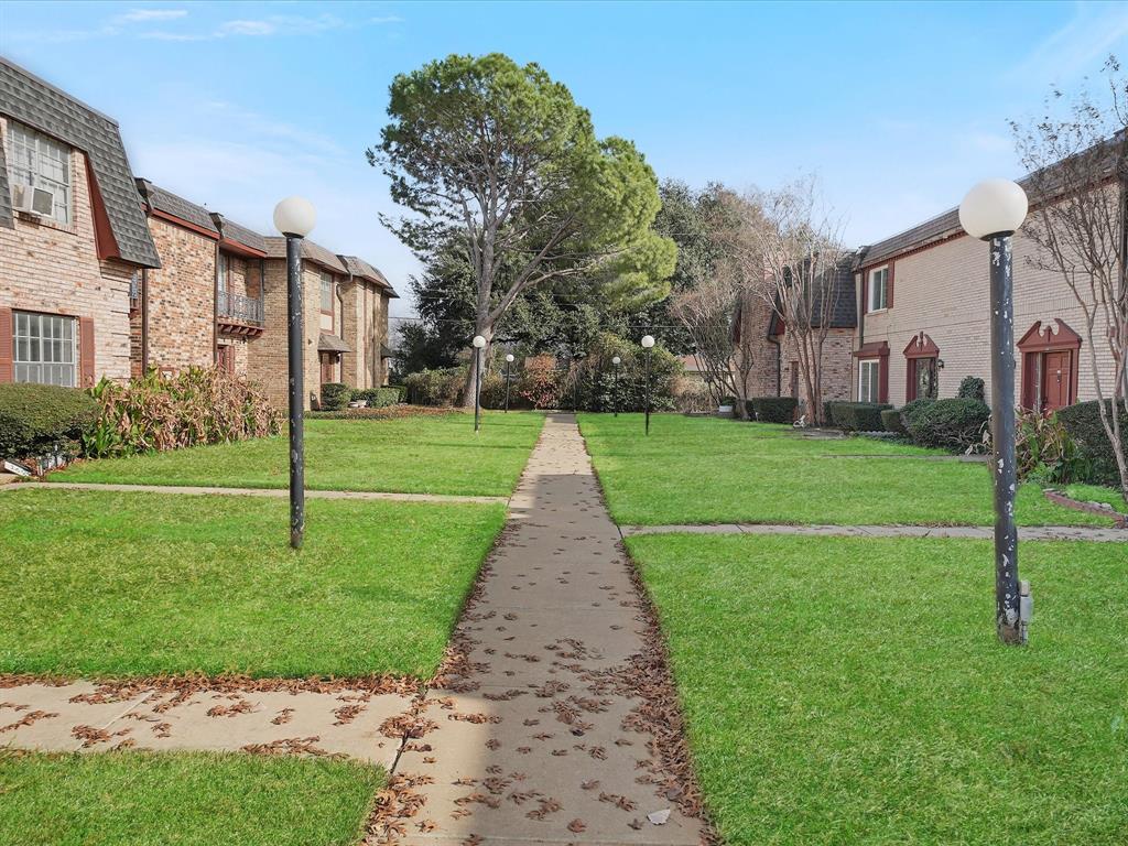 1819 East Grauwyler Road, Unit 178 Irving, TX 75061 - Photo 2 of 22 a view of a park with a large trees