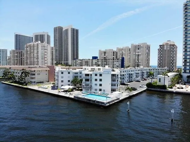 a view of a city with tall buildings