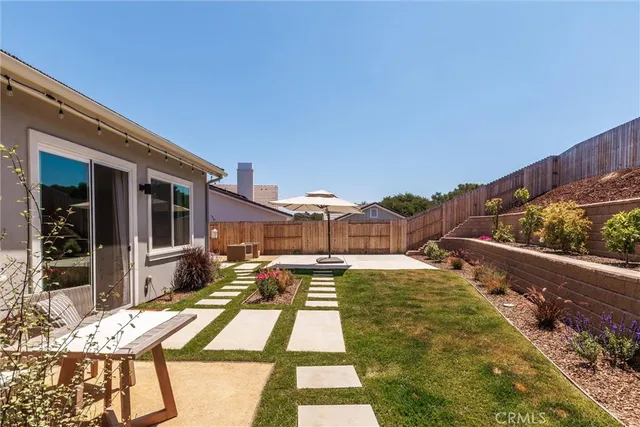 a view of swimming pool with patio
