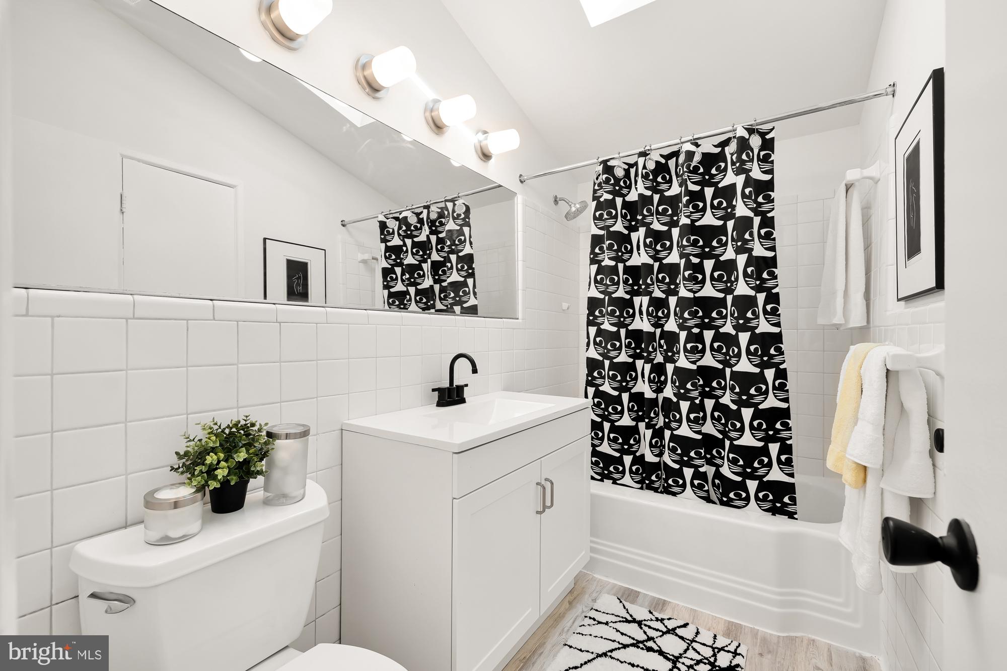 11500 Regnid Drive Silver Spring, MD 20902 - Photo 31 of 50 a bathroom with a sink toilet and shower