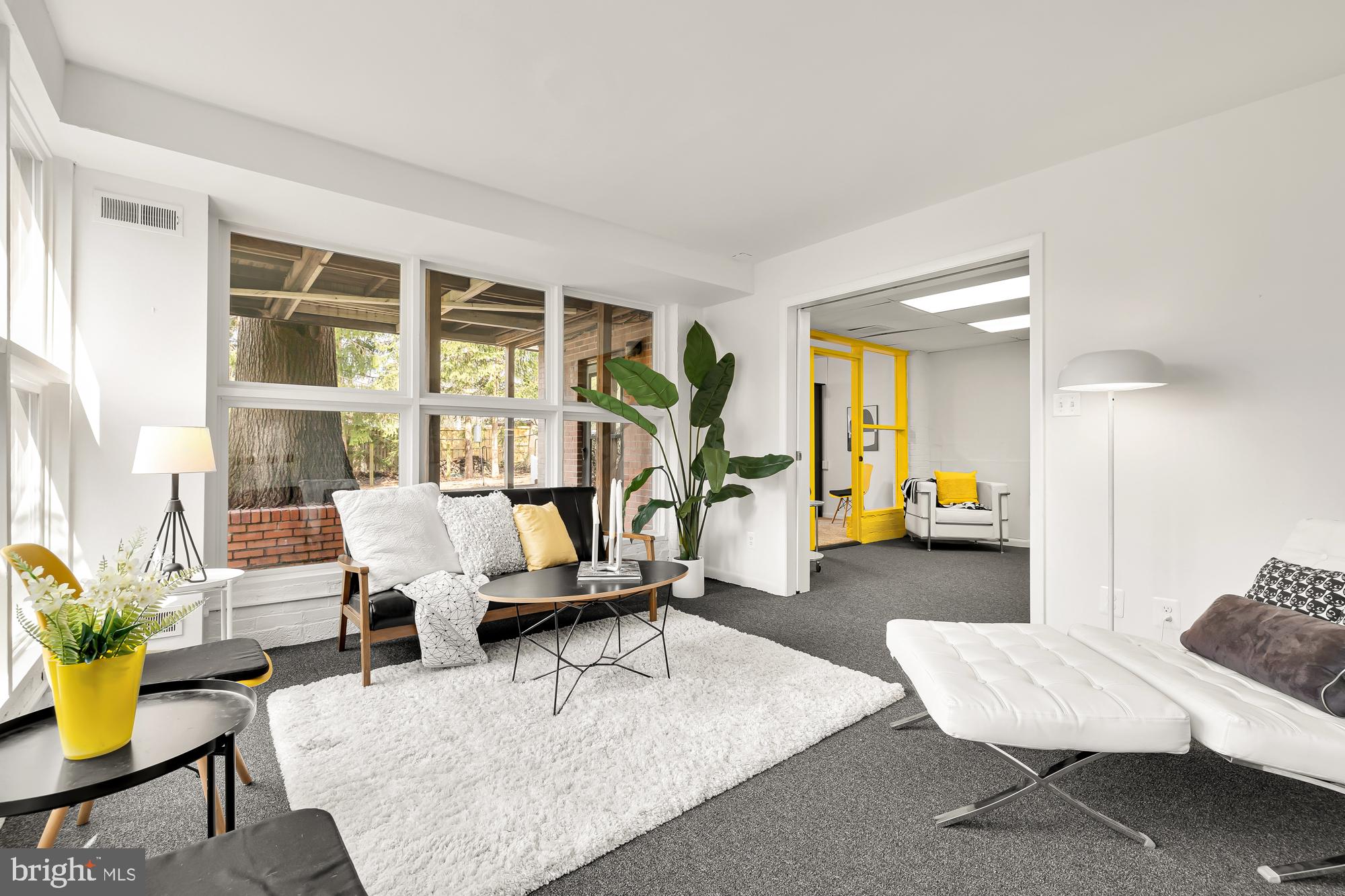 11500 Regnid Drive Silver Spring, MD 20902 - Photo 35 of 50 a living room with furniture and a large window