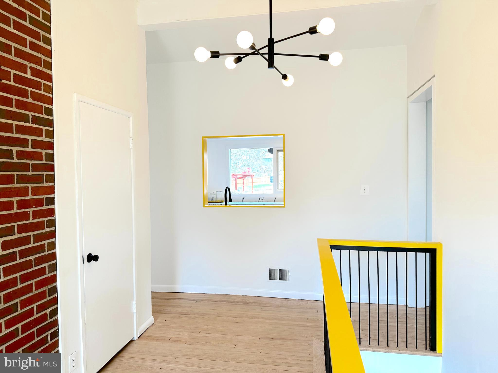 11500 Regnid Drive Silver Spring, MD 20902 - Photo 6 of 50 a view of a hallway with wooden floor