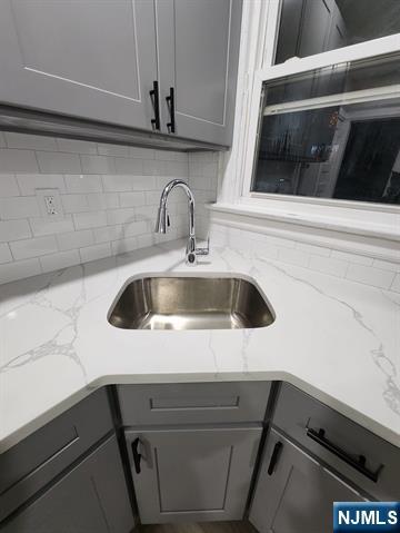 65 Halstead Street, Unit 1 Kearny, NJ 07032 - Photo 6 of 15 a close view of sink and washing machine