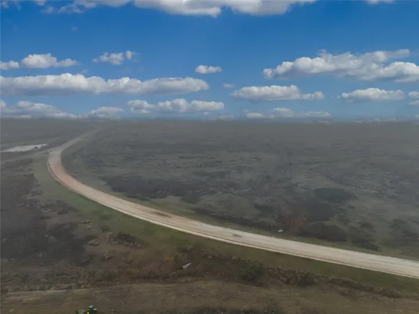 a view of a city with lots of green space