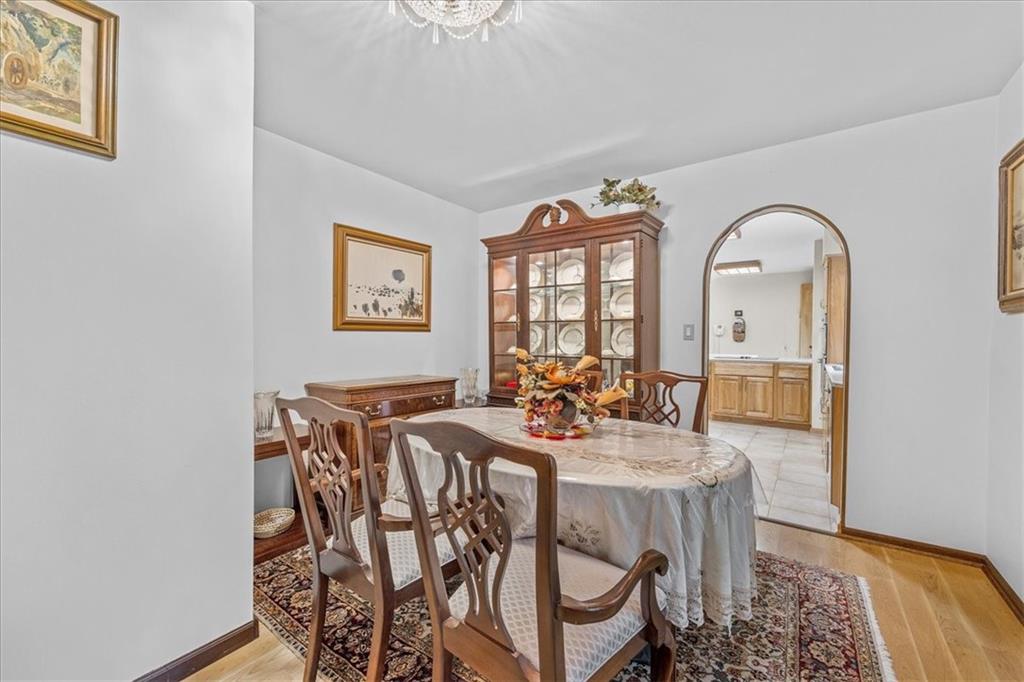 216 Springhouse Lane Pittsburgh, PA 15238 - Photo 13 of 25 a view of a dining room with furniture and chandelier