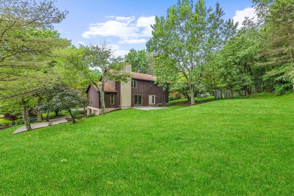 216 Springhouse Lane Pittsburgh, PA 15238 - Photo 5 of 25 a view of a house with a yard