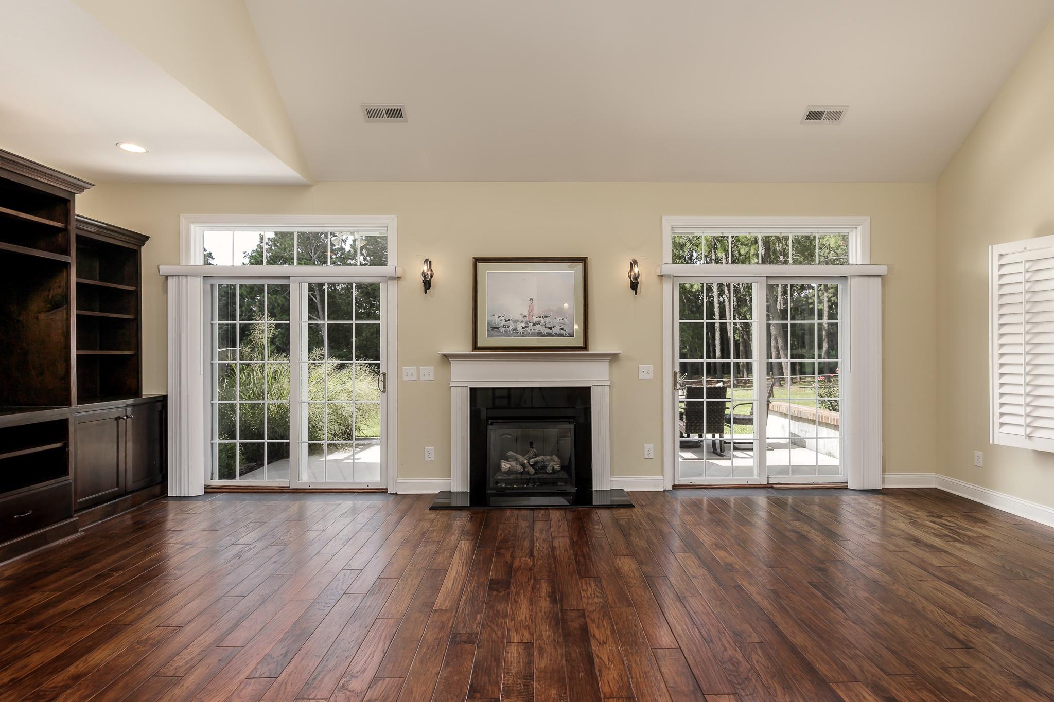949 Sheldon Road Southern Pines, NC 28387 - Photo 9 of 40 The great room has sliding French doors (with screens) onto a terrace.