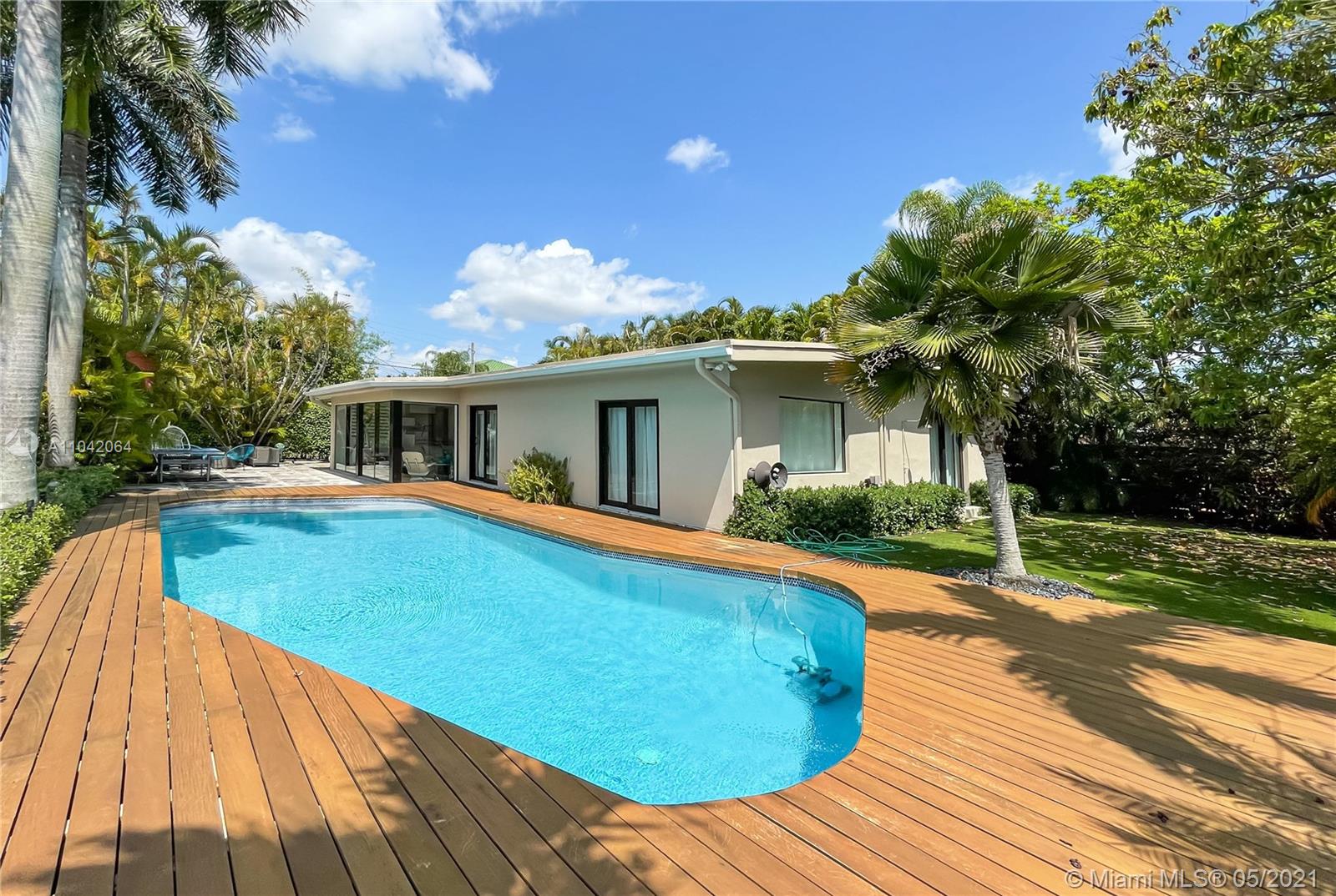 12901 Oleander Road North Miami, FL 33181 - Photo 3 of 22 a view of outdoor space yard and swimming pool