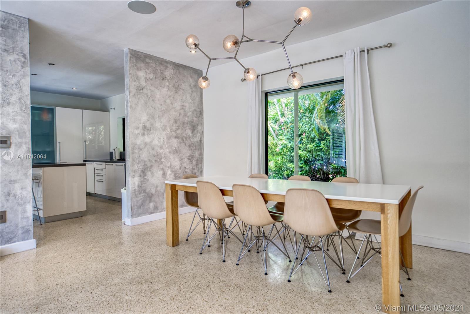 12901 Oleander Road North Miami, FL 33181 - Photo 8 of 22 a view of a dining room with furniture window and outside view
