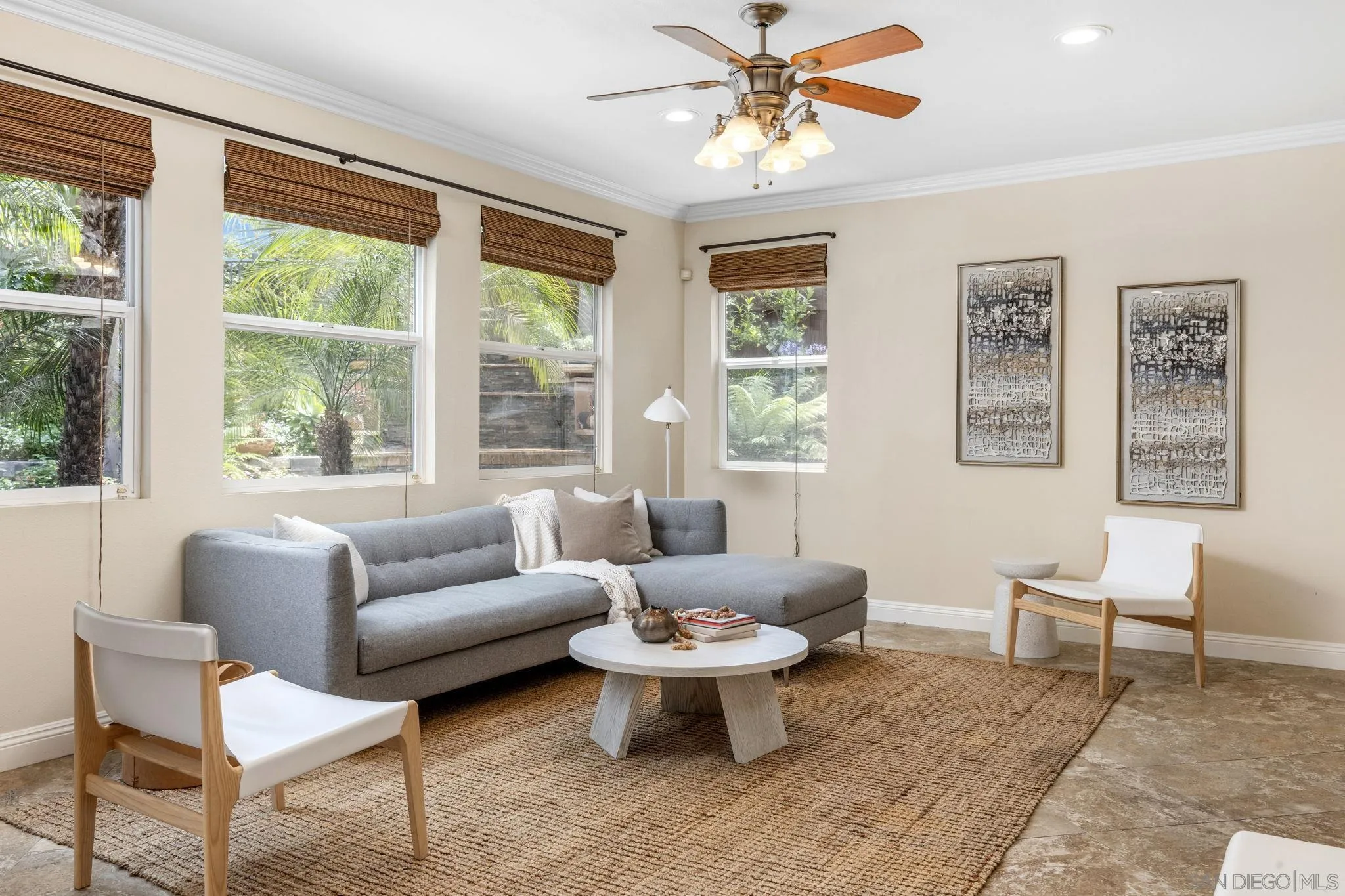 6468 Paseo Cerro Carlsbad, CA 92009 - Photo 11 of 39 a living room with furniture a rug and a large window