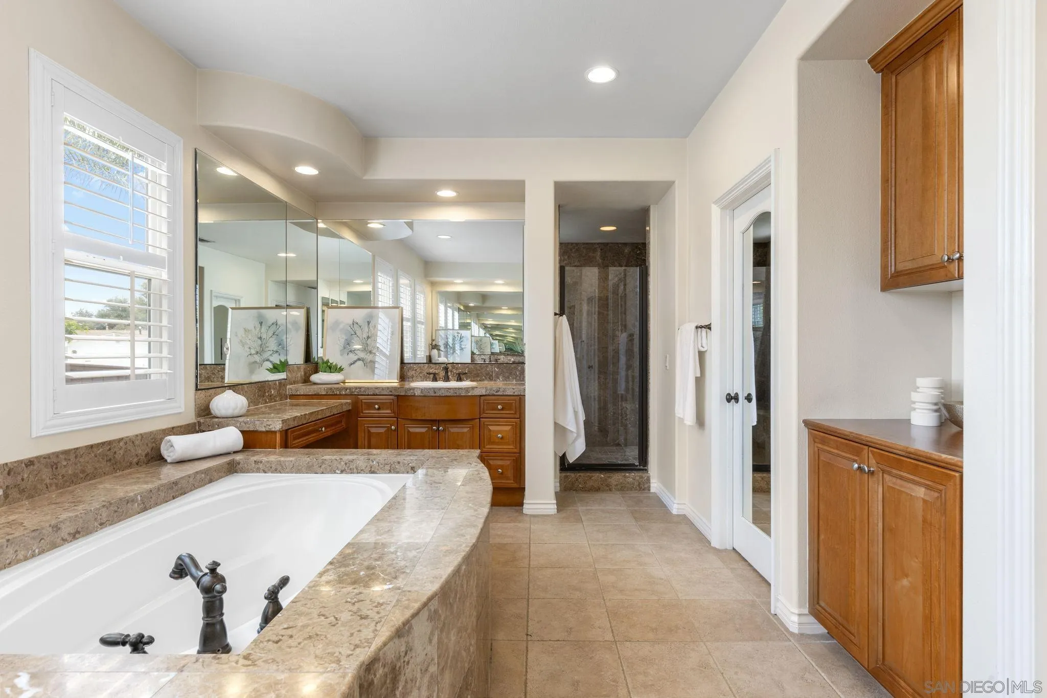 6468 Paseo Cerro Carlsbad, CA 92009 - Photo 21 of 39 a large living room with a large window
