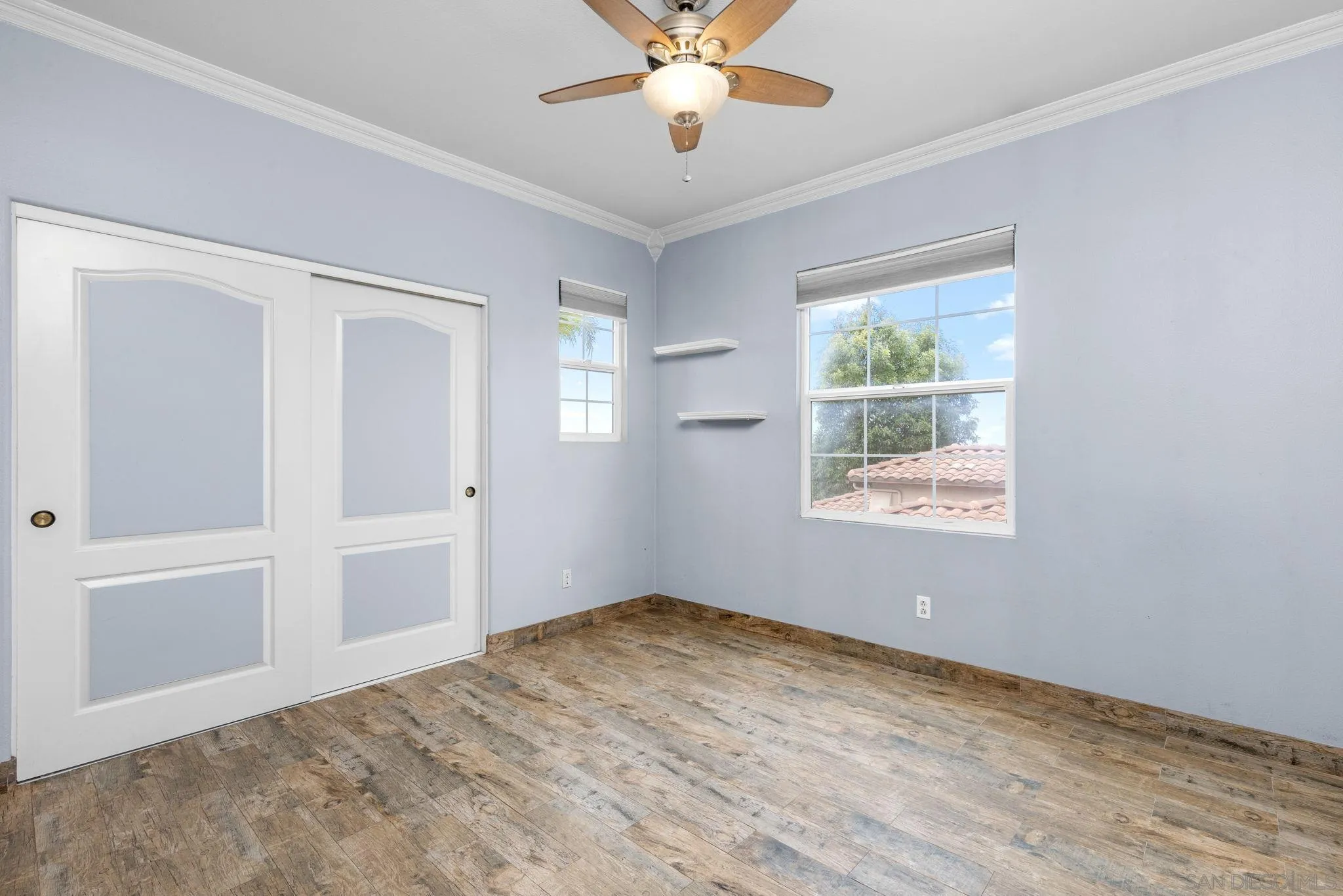6468 Paseo Cerro Carlsbad, CA 92009 - Photo 26 of 39 a view of an empty room with a window