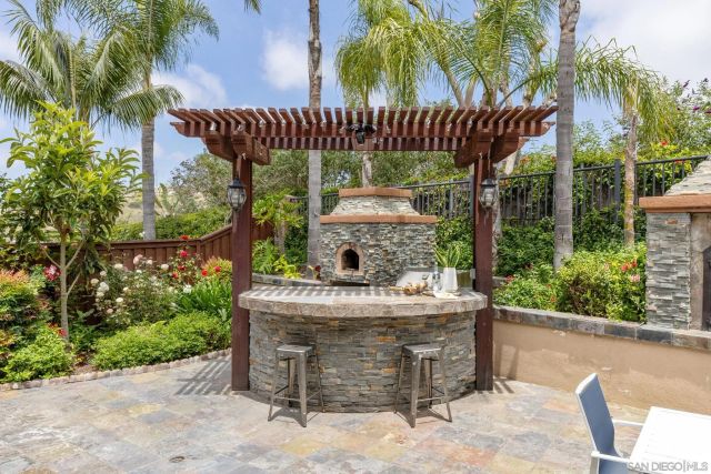 a view of a dinning table in a patio
