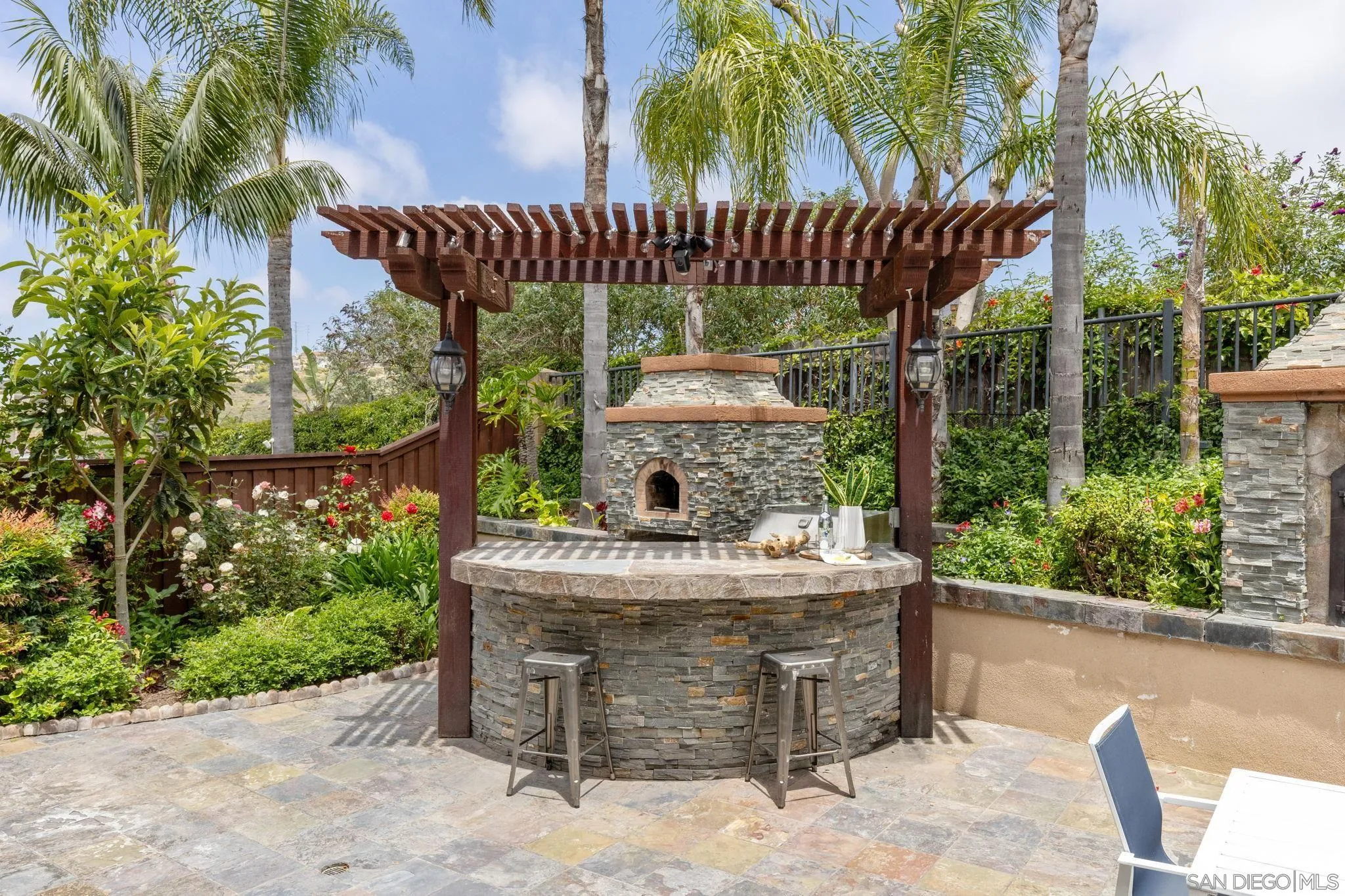 6468 Paseo Cerro Carlsbad, CA 92009 - Photo 32 of 39 a view of a dinning table in a patio