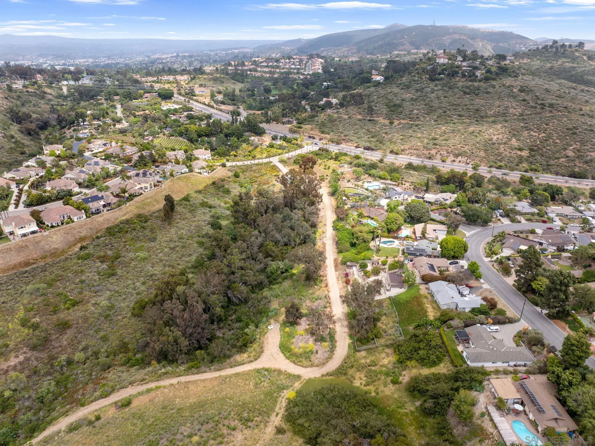 6468 Paseo Cerro Carlsbad, CA 92009 - Photo 38 of 39 an aerial view of residential houses with outdoor space