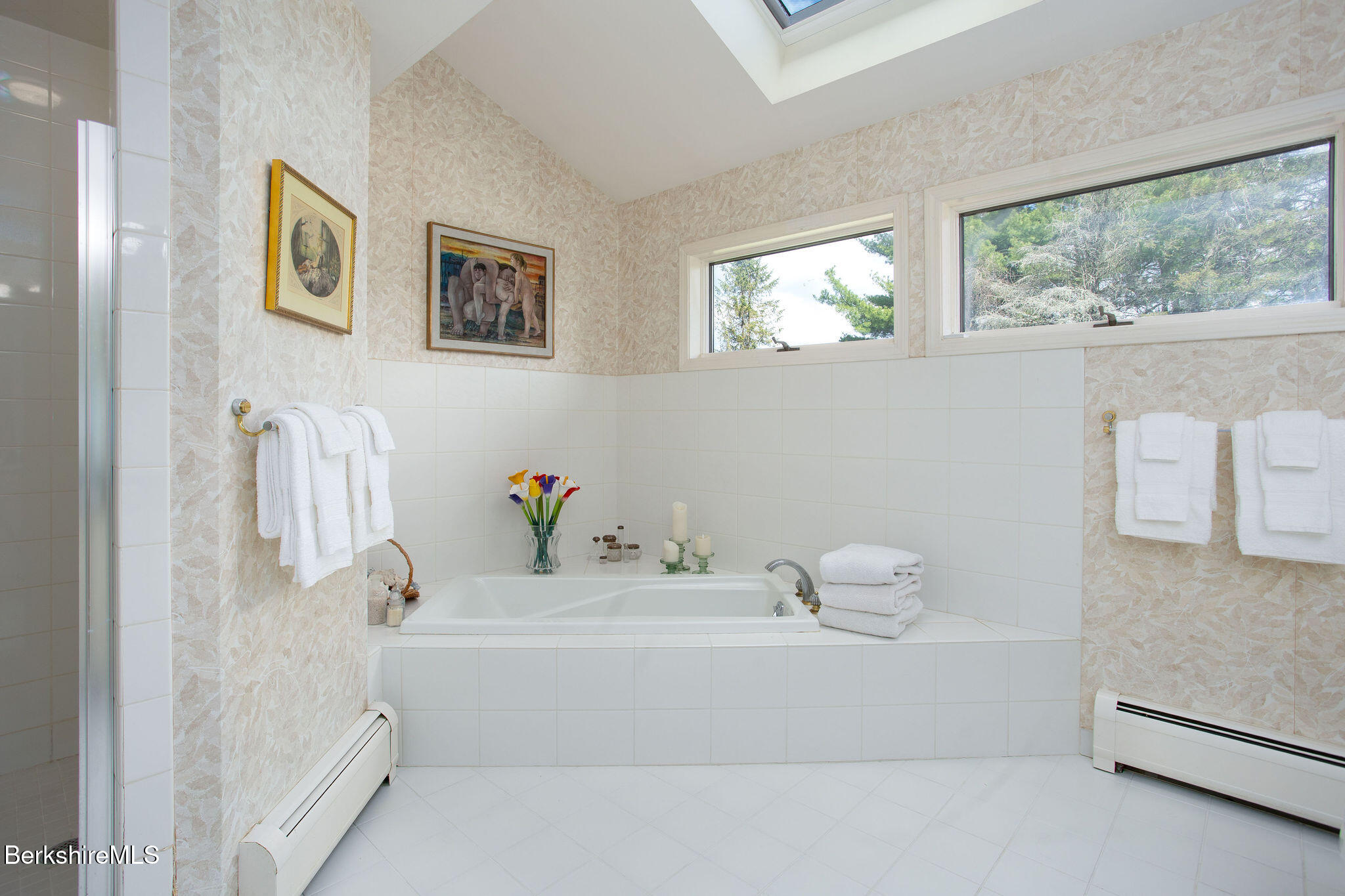 77 Hurlburt Road Great Barrington, MA 01230 - Photo 30 of 48 a bathroom with a tub and a window