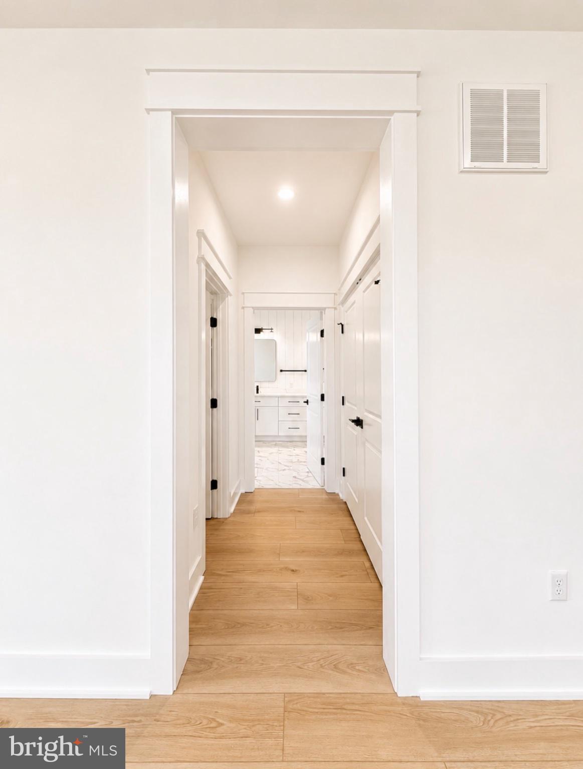 21963 Hardscrabble Road Georgetown, DE 19947 - Photo 22 of 43 Bright, inviting hallway awaits you.