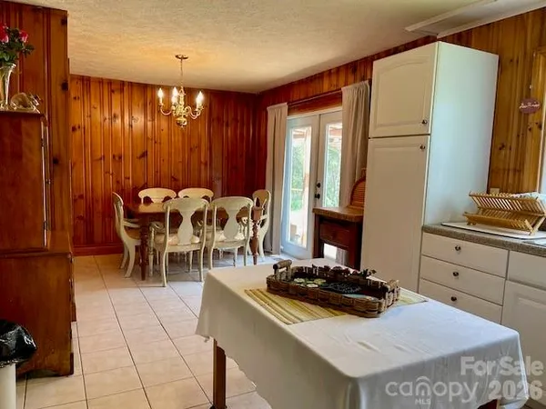 a kitchen with a stove and a refrigerator