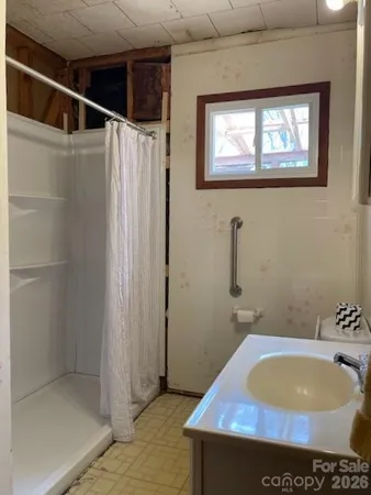 a bathroom with a sink and bathtub