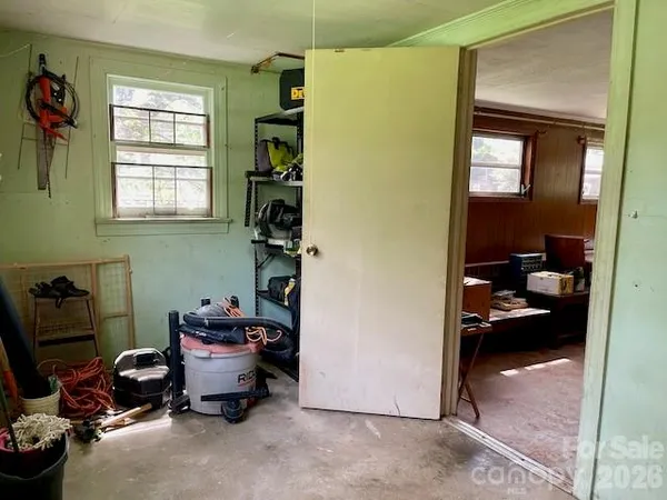 a room with furniture and a window