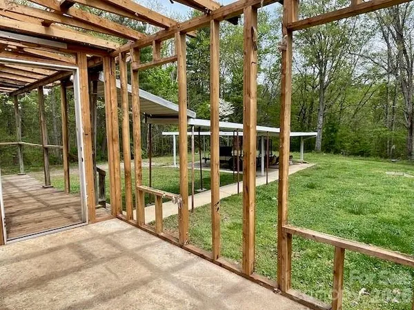 a view of backyard with green space