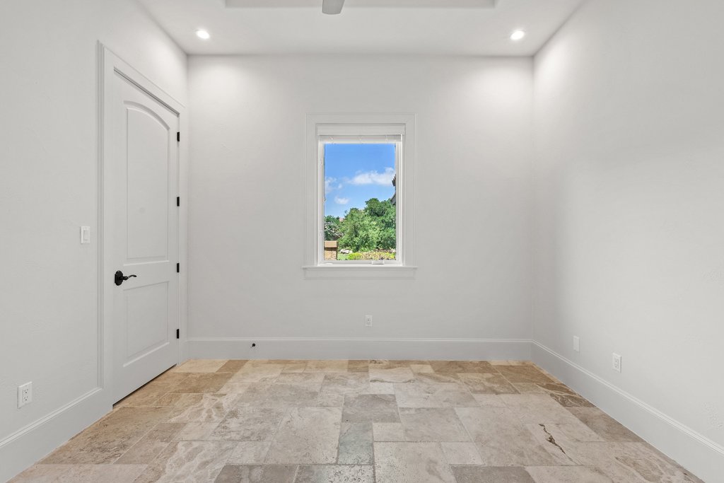 102 Long Point Cove Georgetown, TX 78628 - Photo 30 of 36 a view of an empty room with a window