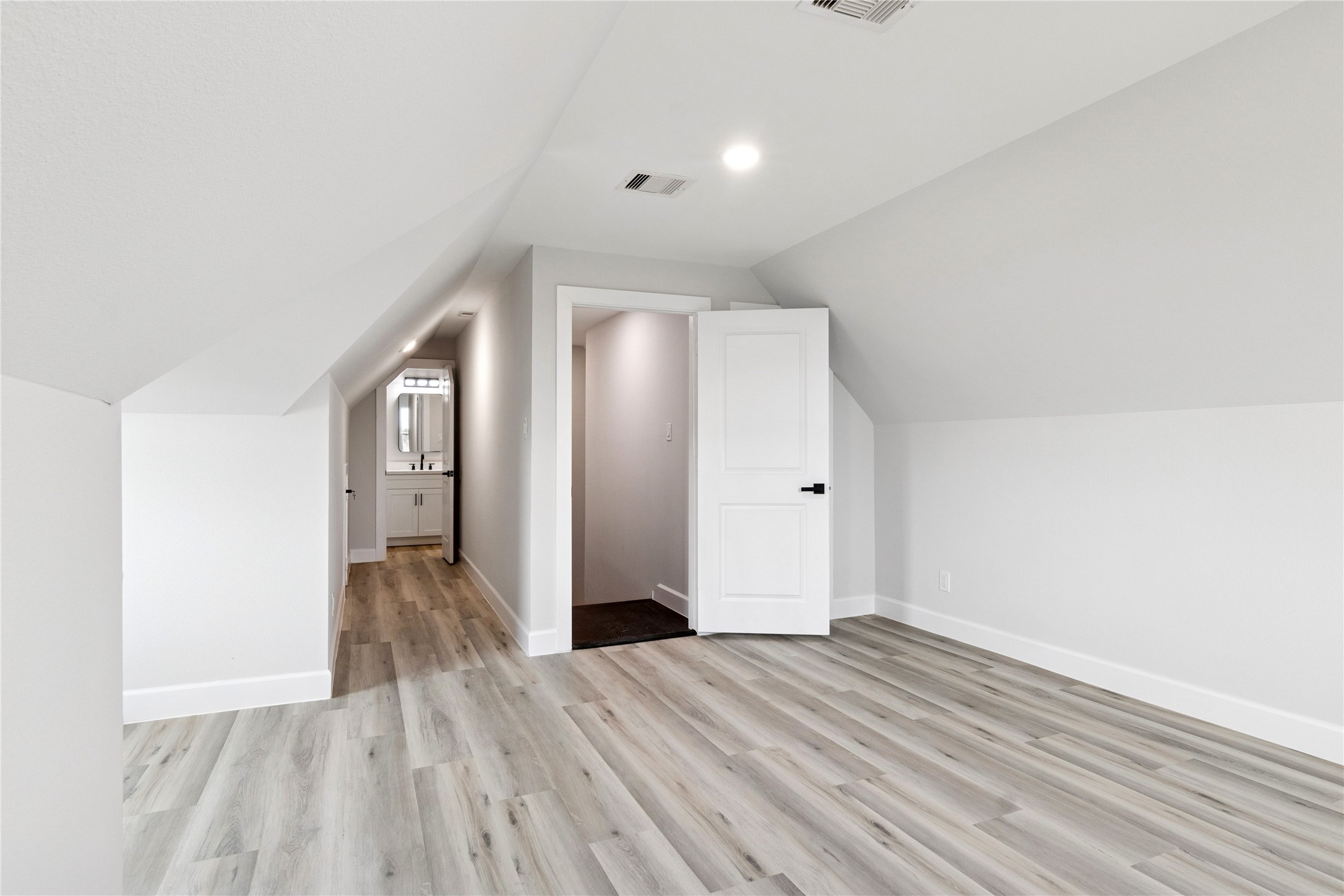 5766 Ward Bend Road Sealy, TX 77474 - Photo 37 of 45 a view of hallway with wooden floor